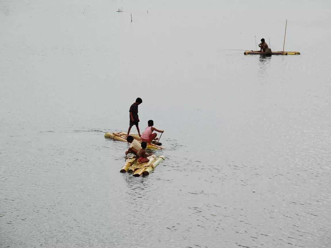 Rafting children in floodwaters